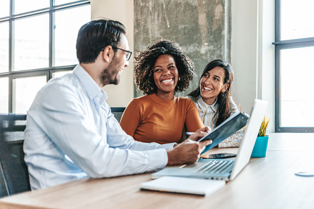 Business team people working together at an office setting