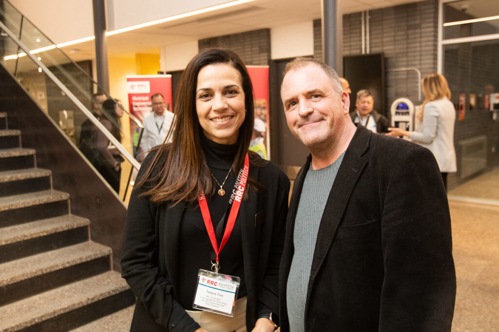 Two co-op coordinators standing next to each other at the Skilled Trades building
