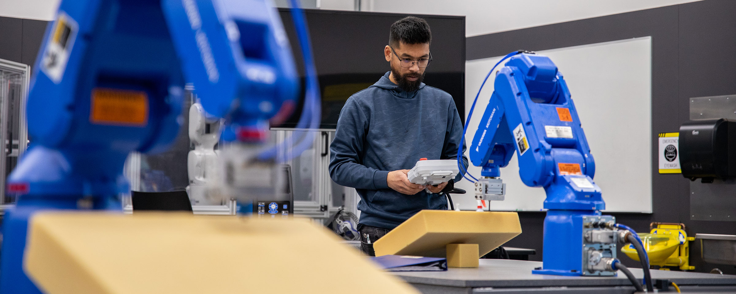 Student working in a robotics lab