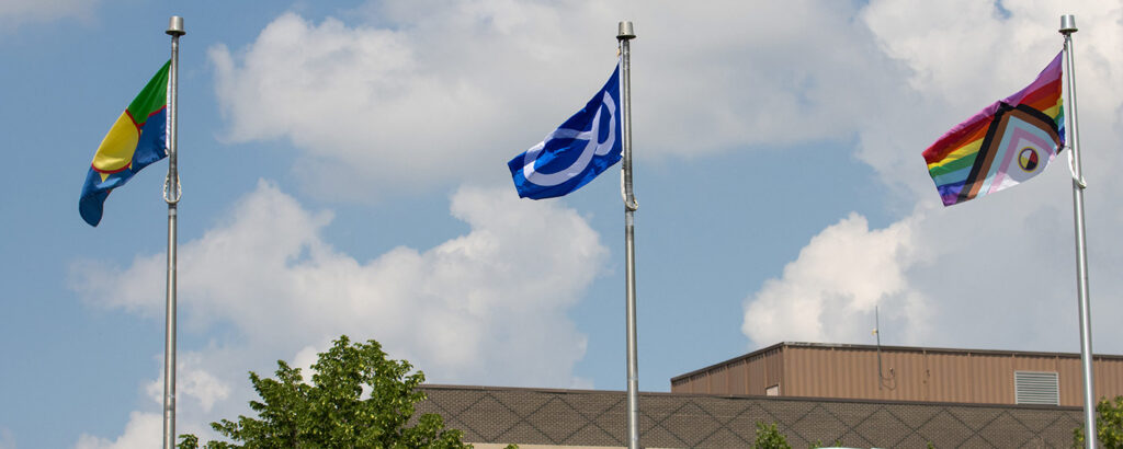 Three flags at the Notre Dame Campus
