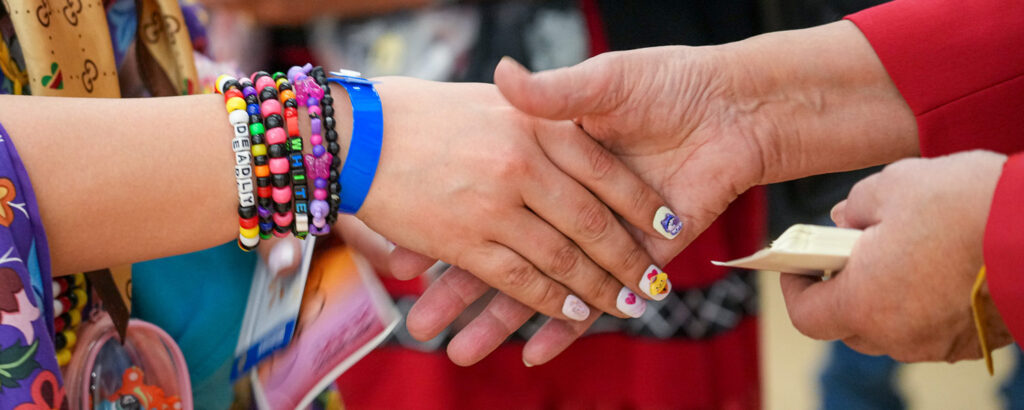 Two people shaking hands