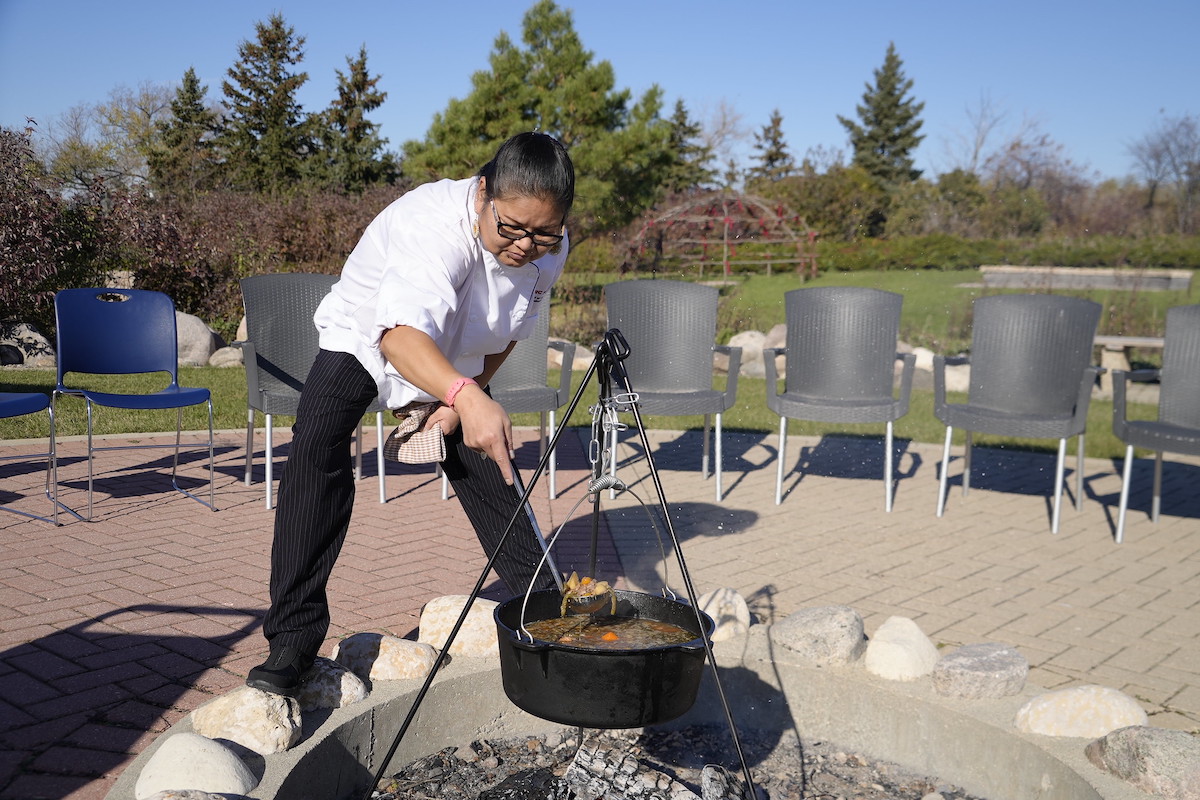Student practicing culinary skills outdoor