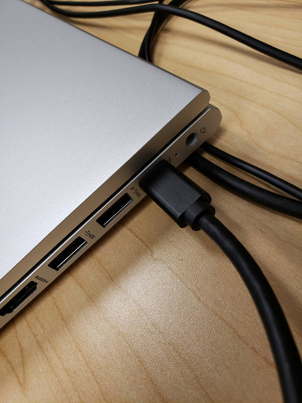 plug in the USB-C dock into the laptop