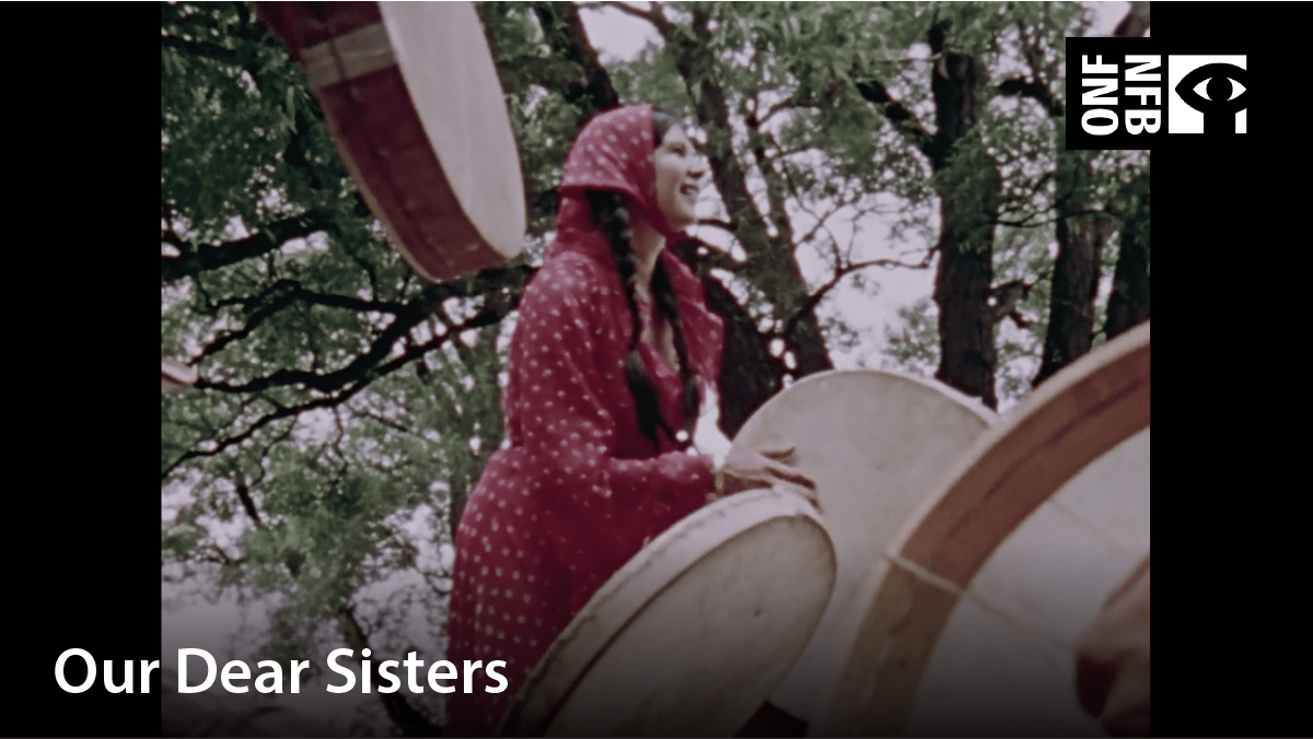 Young Indigenous girl participating in drumming group. Film title: Our dear sisters