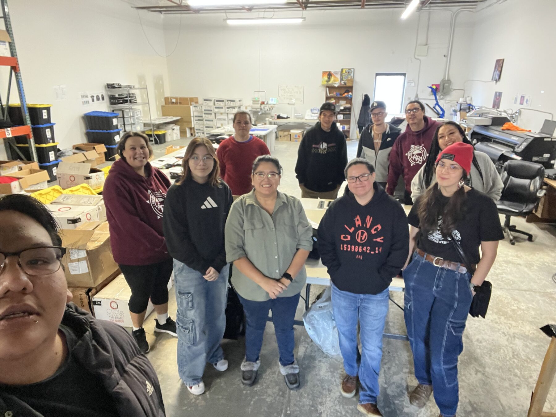 group of people in a clothing workshop