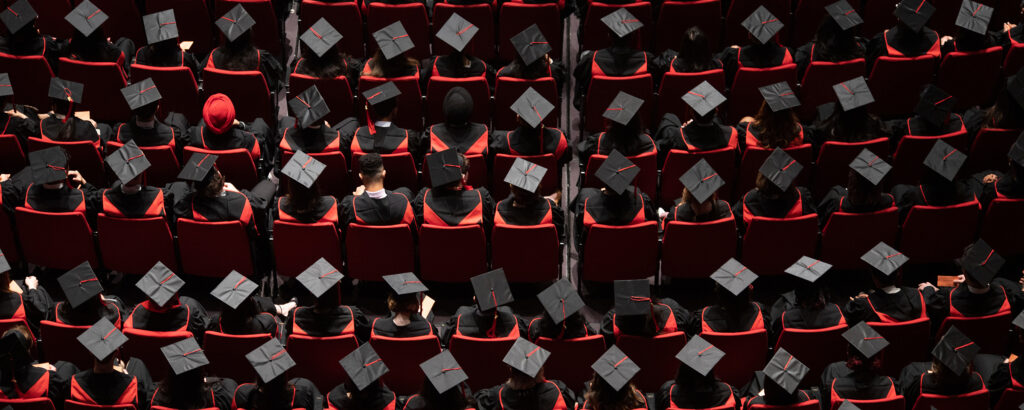 A sea of grads wearing caps and gowns