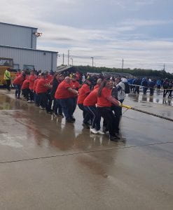 RRC's staff team pulling plane