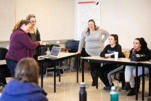 Students using American Sign Language