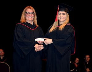Janice Hyde (vice-chair, RRC Board of Governors) presents Jessica Burzminski with her Lieutenant Governor's Medal 