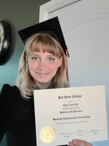 RRC grad Sadie Tait with certificate