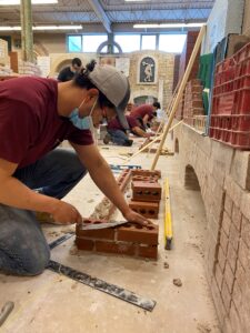 RRC Polytech students working in masonry lab as part of Skills Manitoba competition