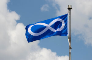 Métis flag (white infinity symbol over blue background)