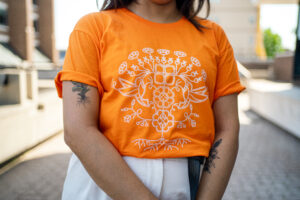 Close-up of Leticia Spence's design for Orange Shirt Day 2023.
