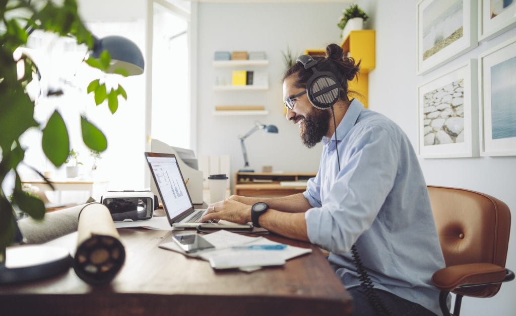 Man working at desk in home office