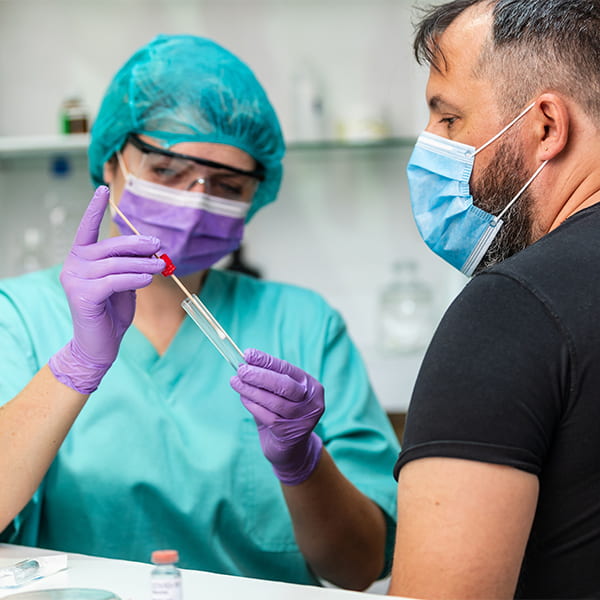 Health worker helping a patient