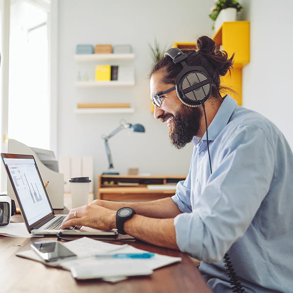 Man taking a micro-credential course online