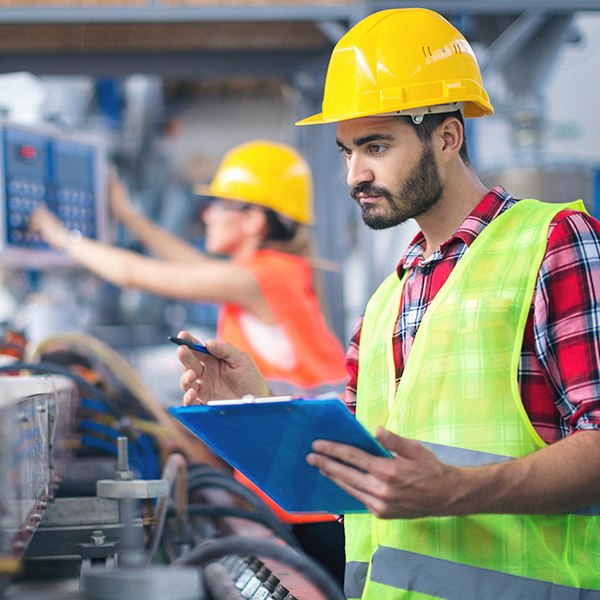 Man inspecting a machine