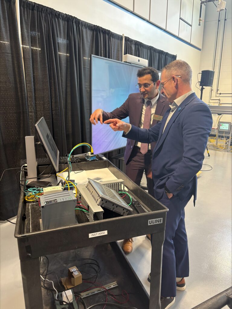 two people discuss electrical components  