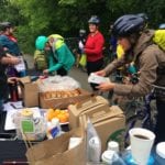 Cyclists enjoying free treats at the RRC Polytech Bike to Work Day Pit Stop