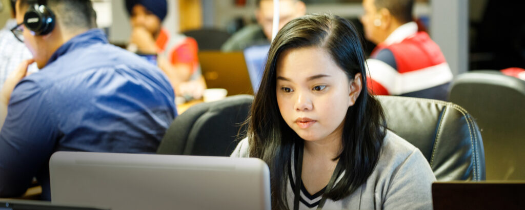 Student working on a laptop