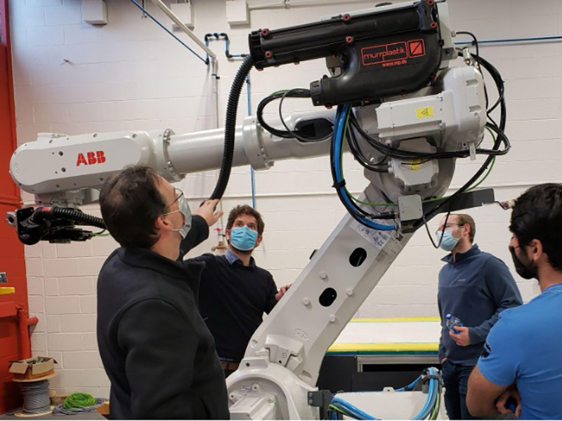 People working in a robotics lab