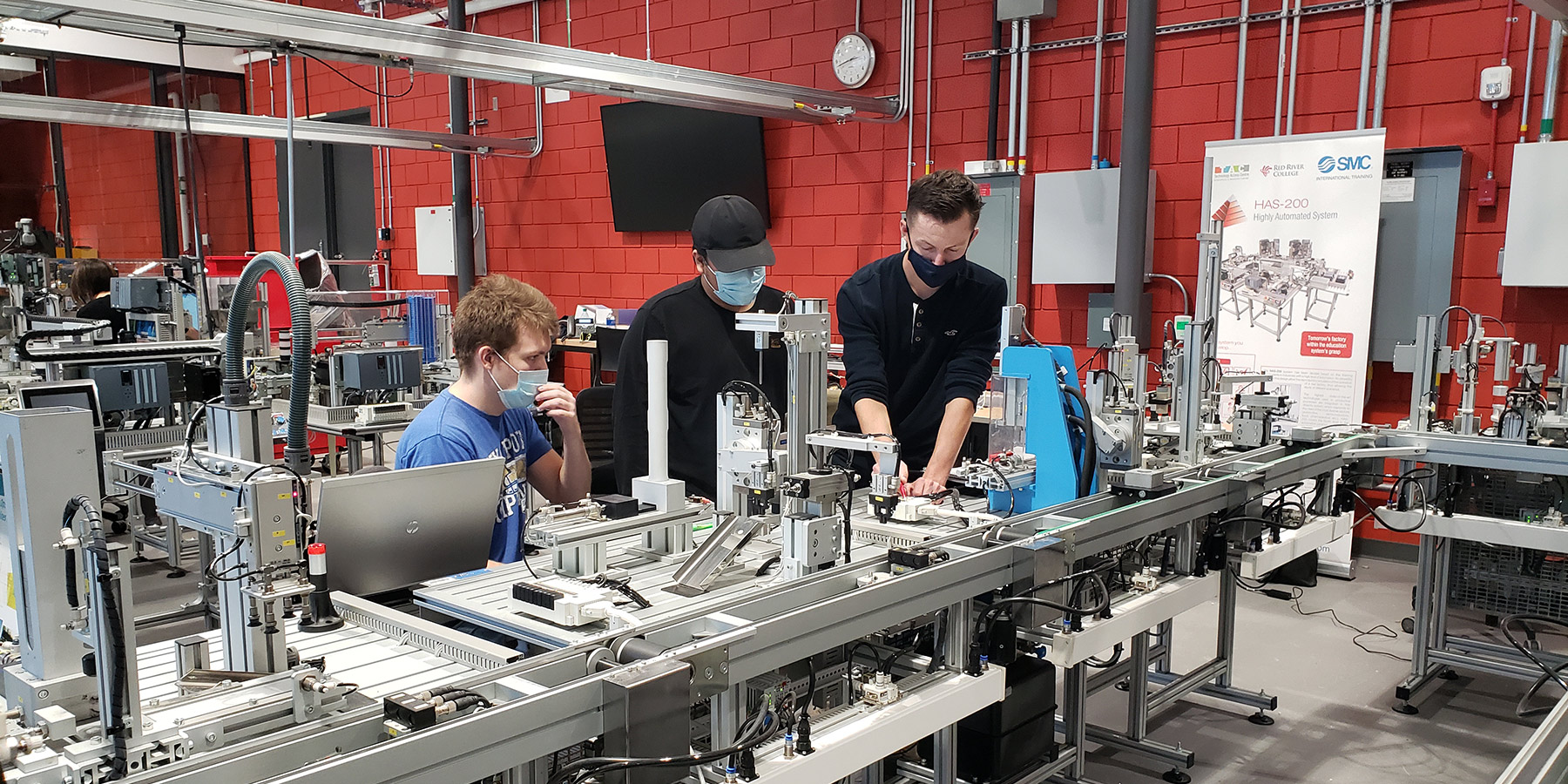 Students working in a robotics lab