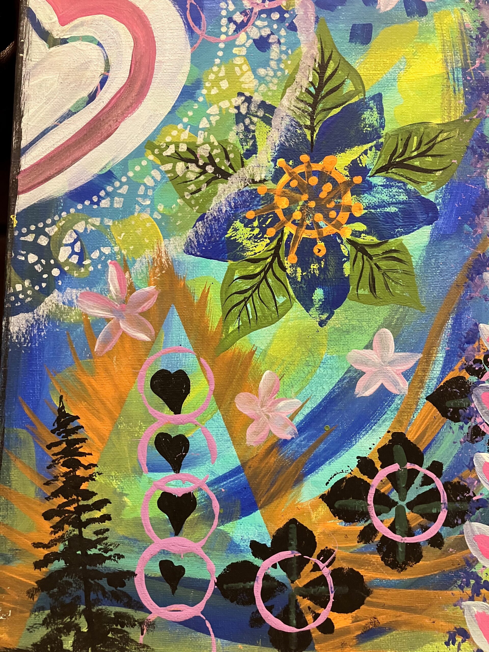 Sample 4 of a colourful painting created with stencils and other random items with trees, hearts, circles