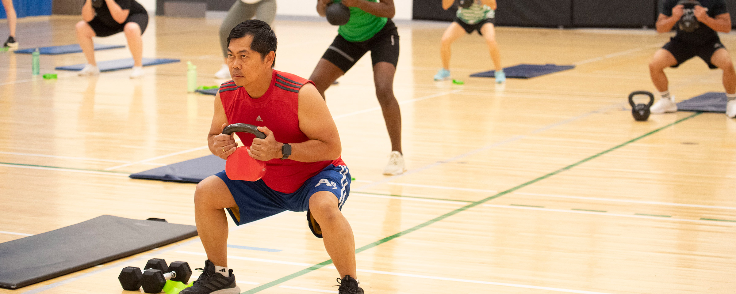 Man participating in fitness class