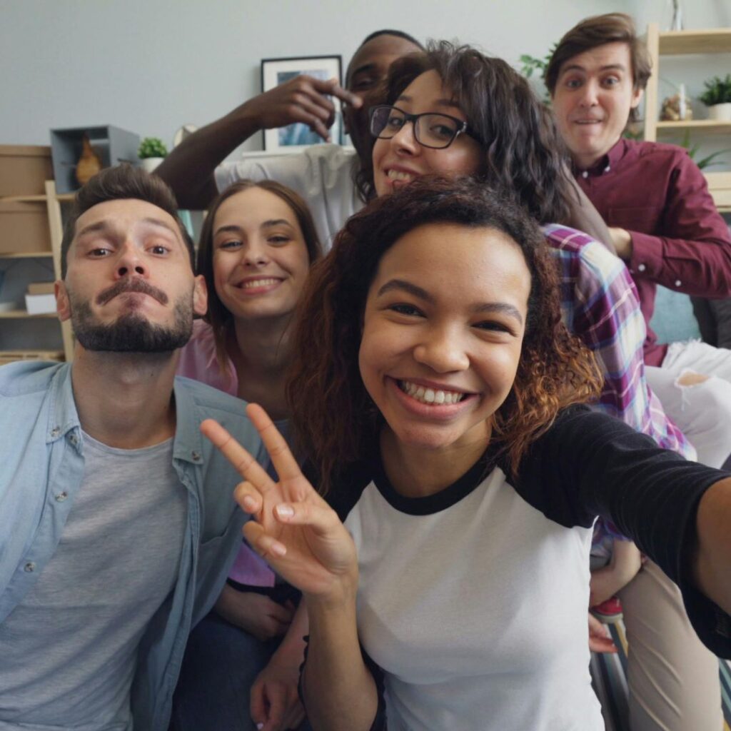 Group of college students taking a selfie.