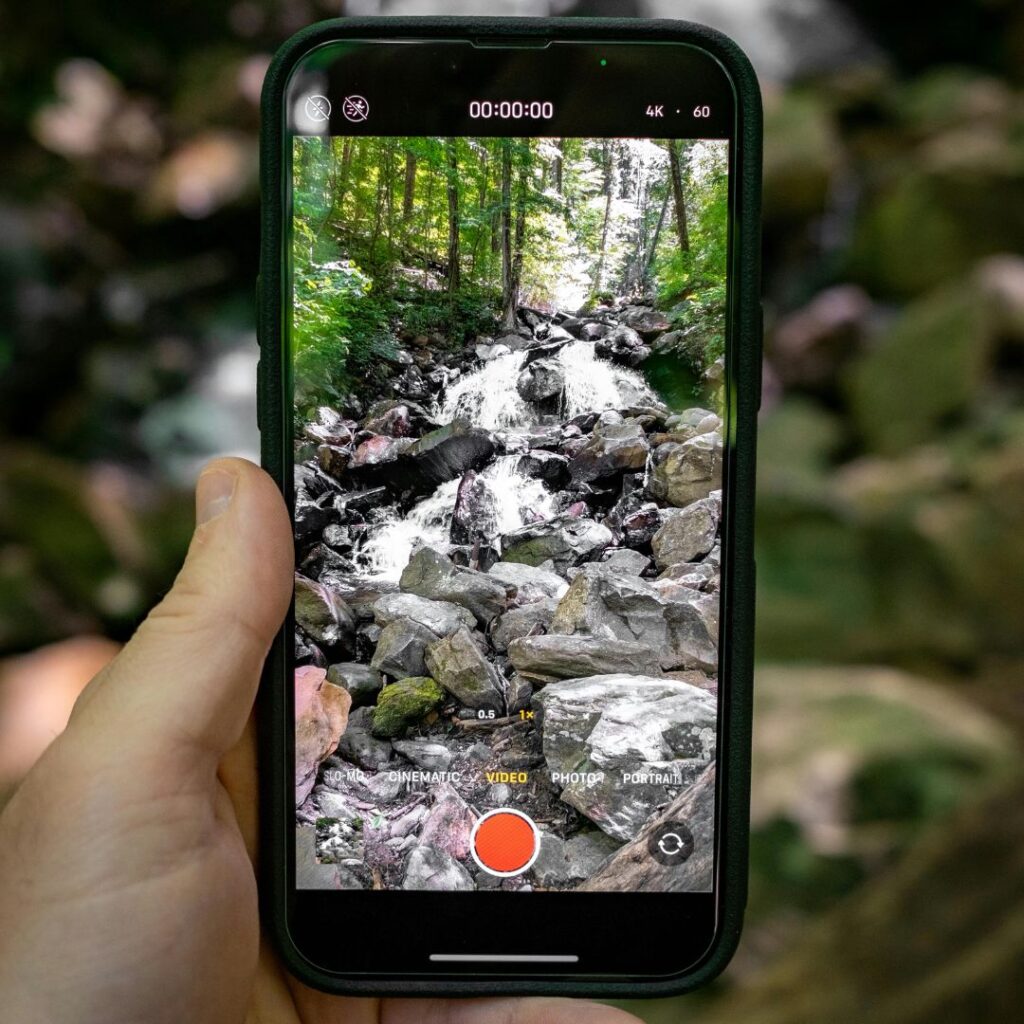 Iphone taking a video of a small waterfall