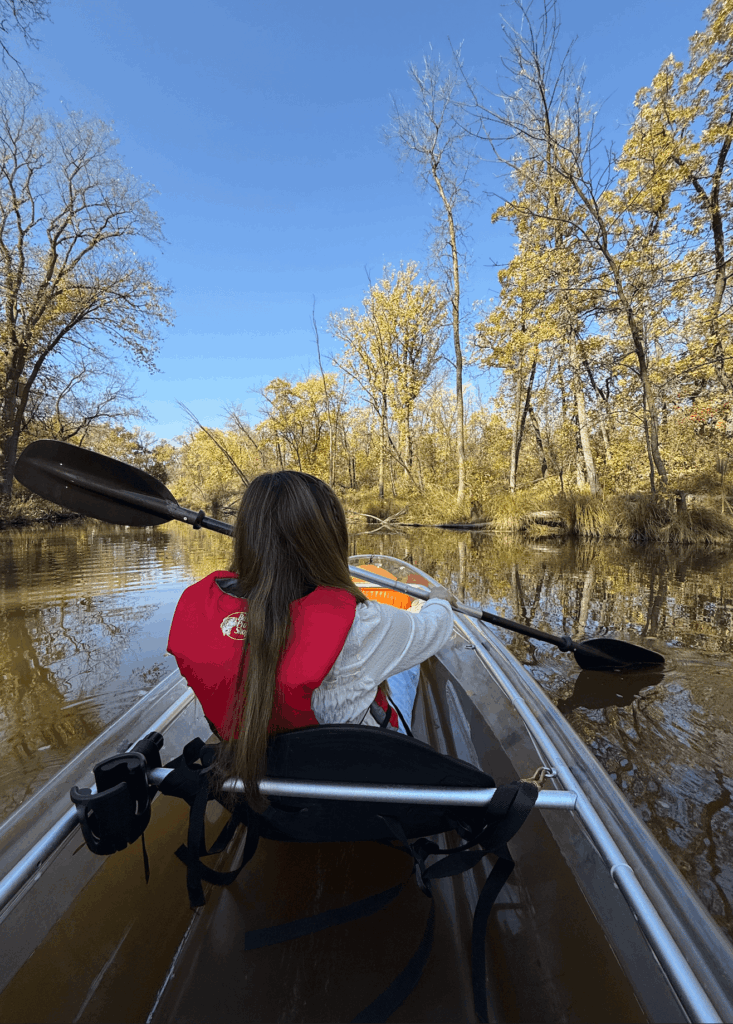 Person canoe down a river