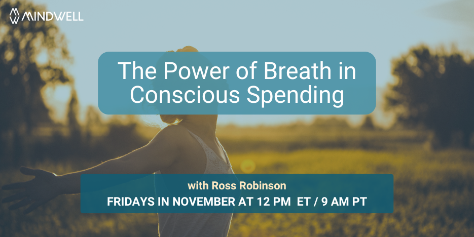 woman standing with arms wide open, looking at sky in a field 