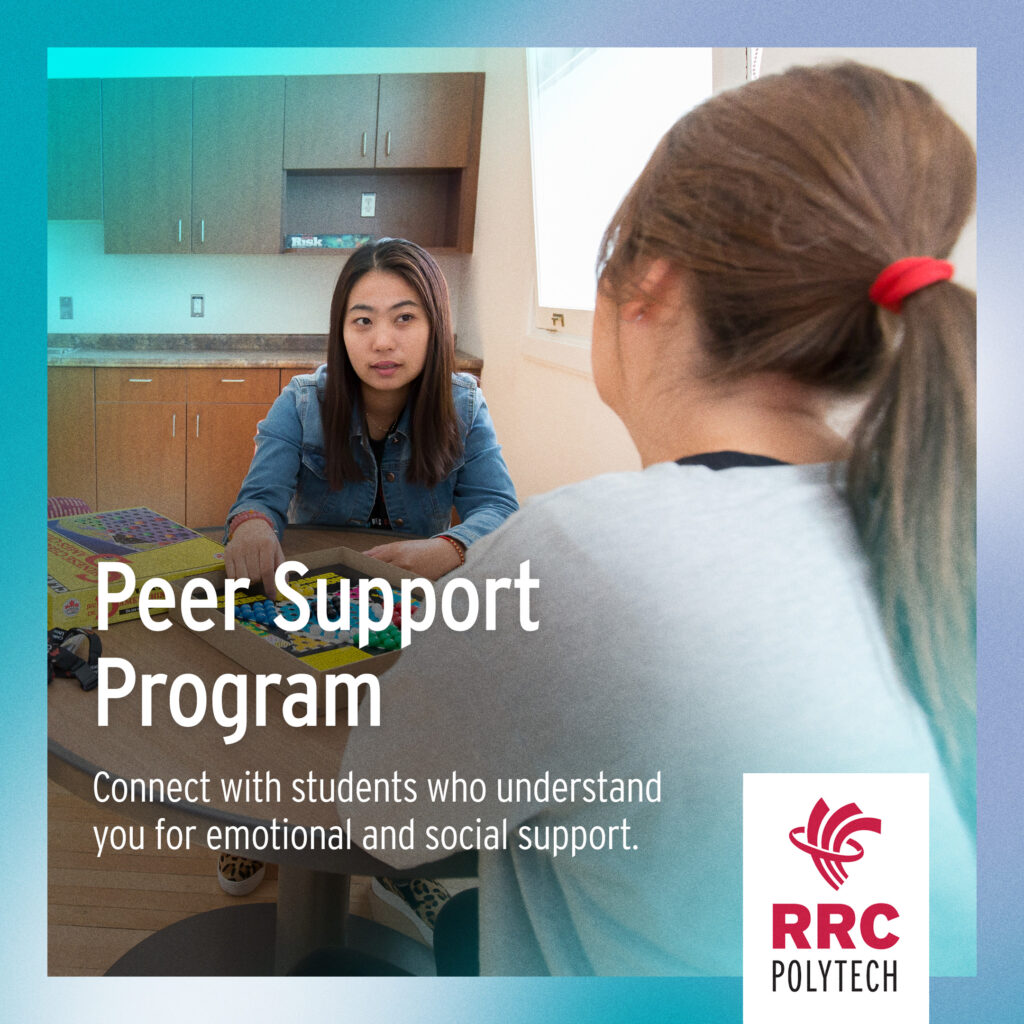 two students talking to each other over a board game