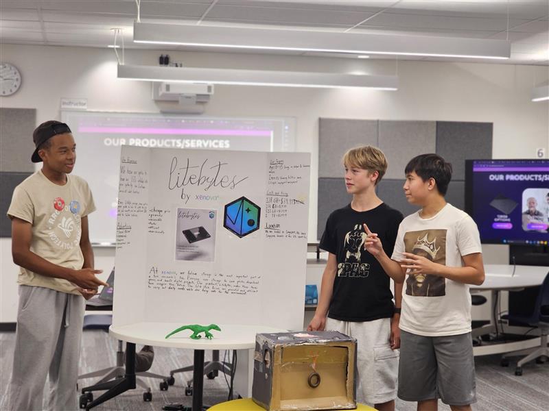 A group of 3 campers are presenting a product called "lifebytes" in their Entrepreneurship camp