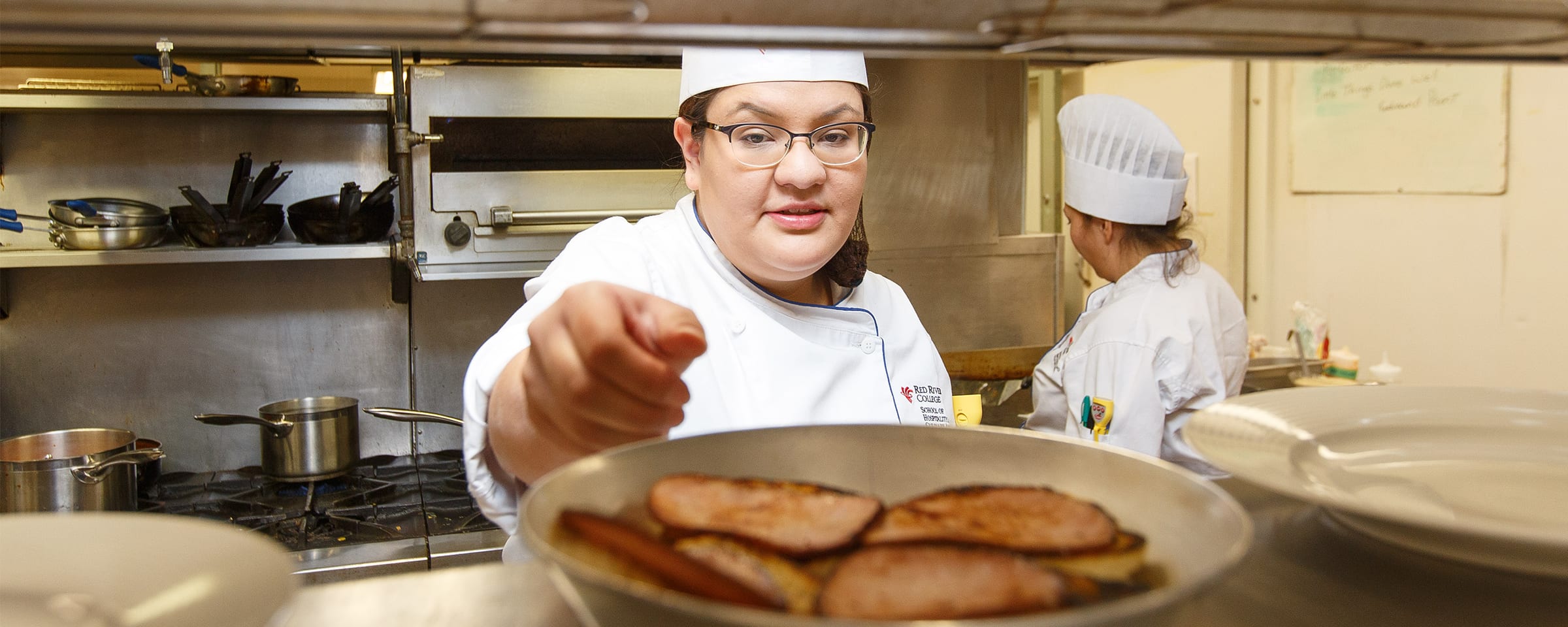 Culinary Skills student working in kitchen