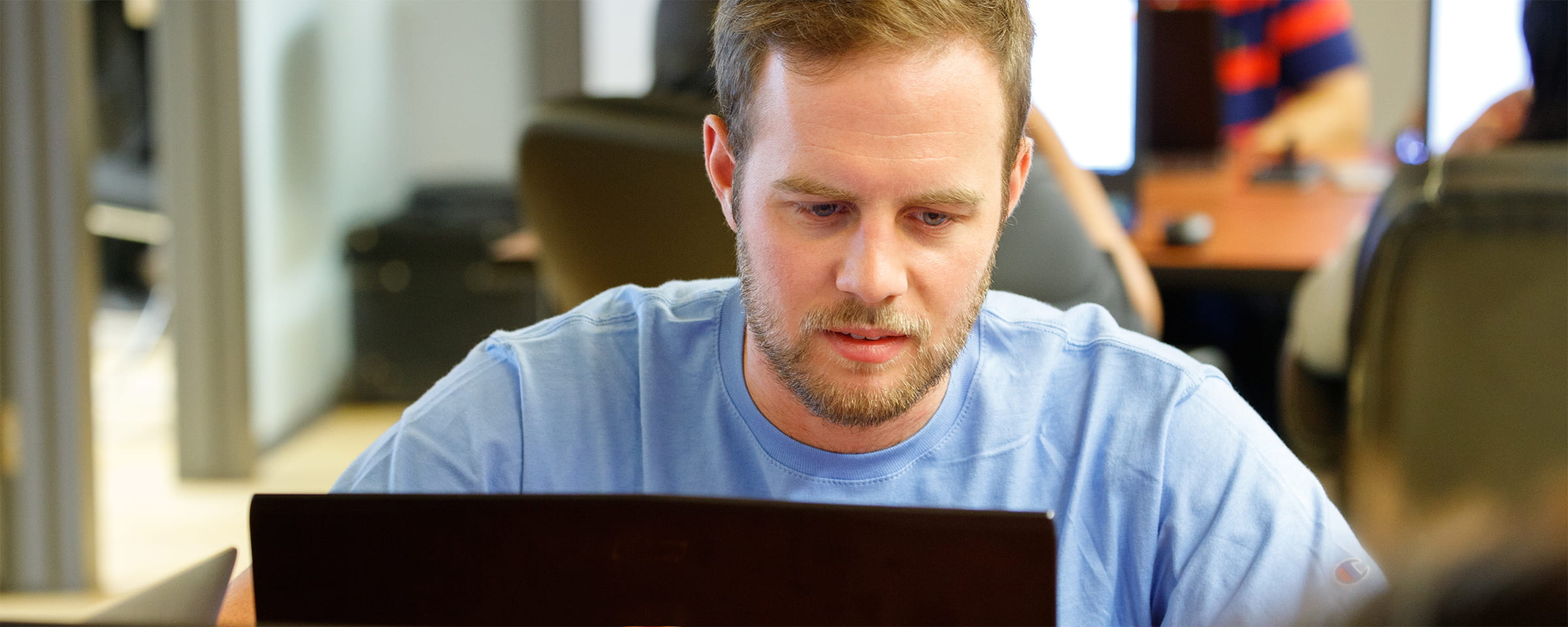 Young man working on laptop