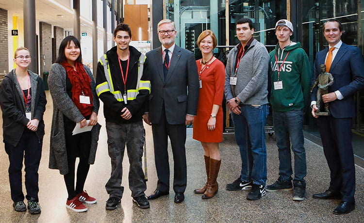 Group of people standing in atrium