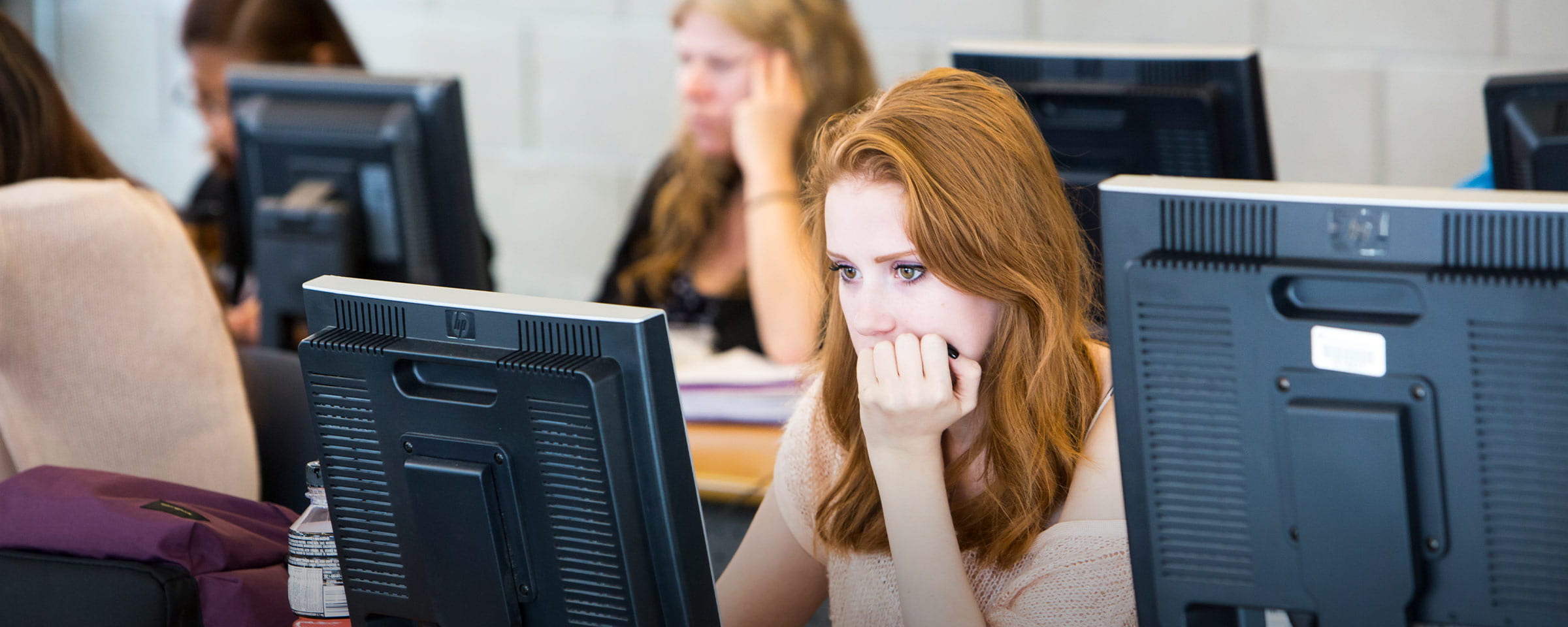 Young woman working in computer lab