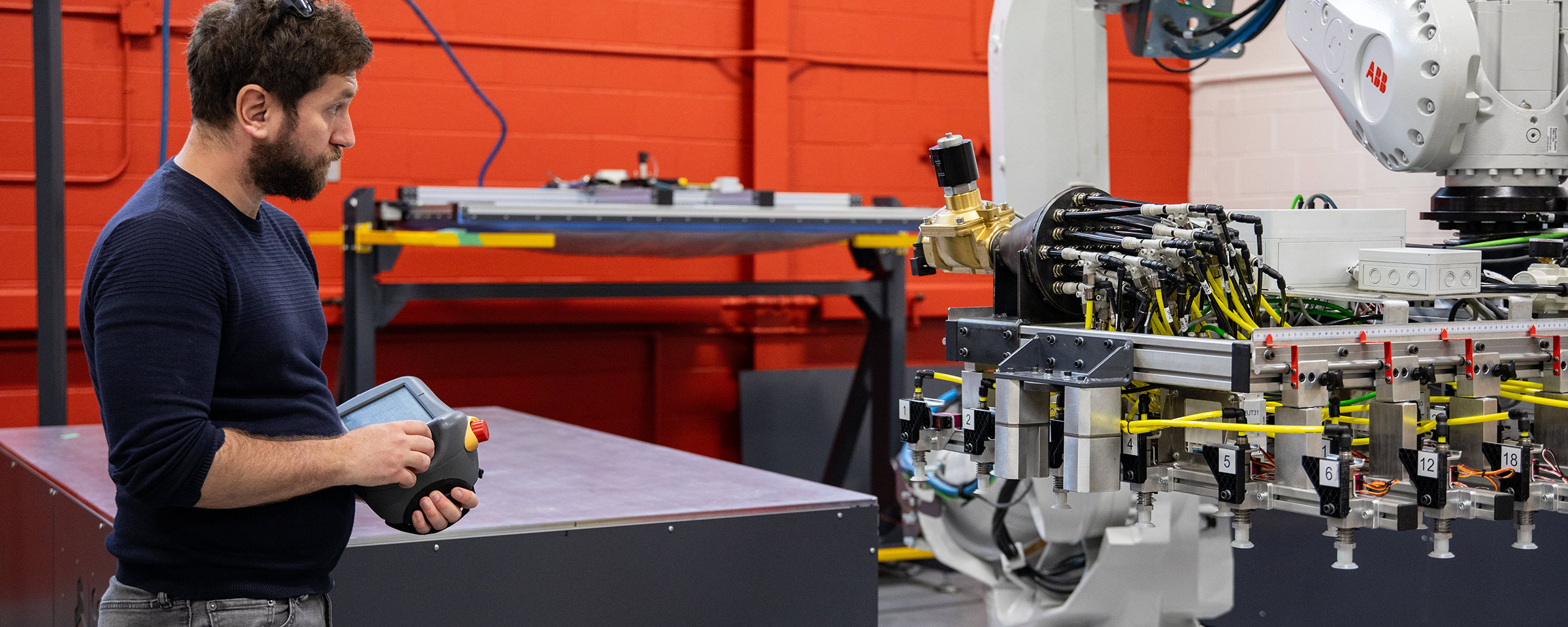 Man working with robotics in a lab