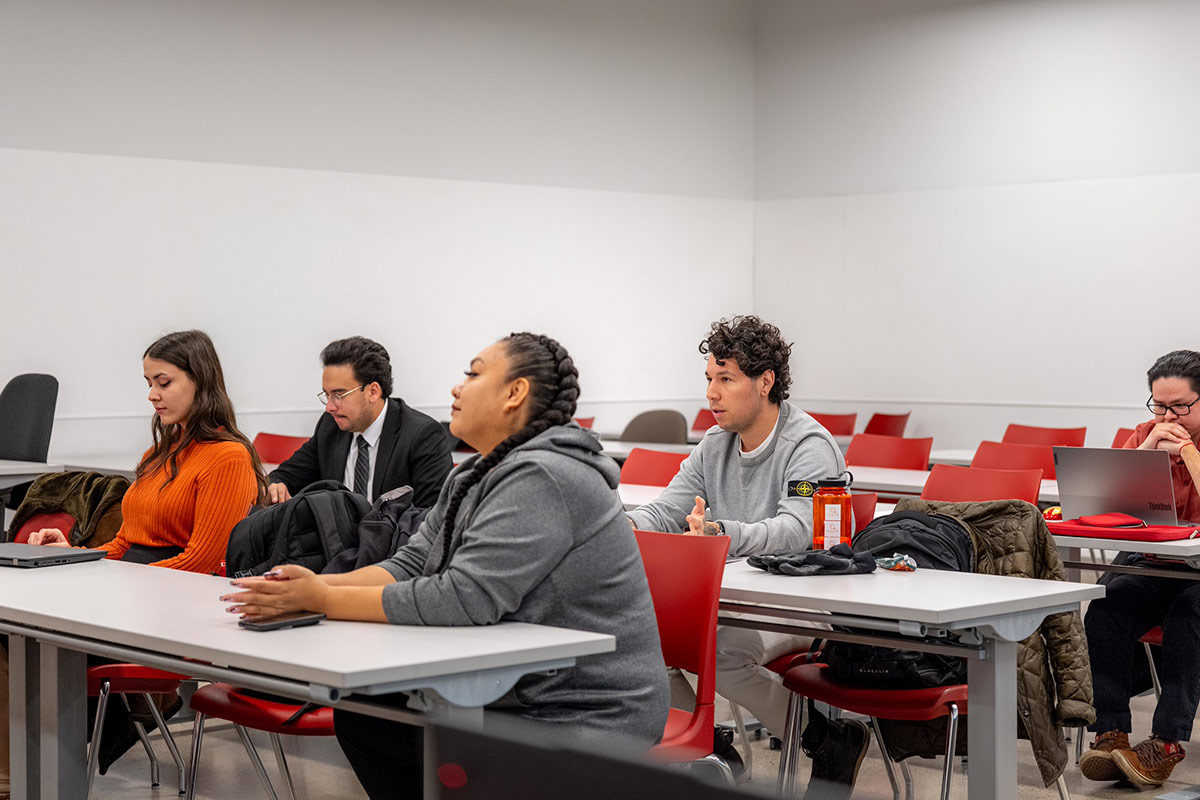 students watching a lecture in a classroom.