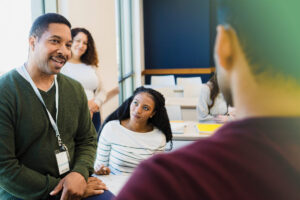 Instructor talking to students in a classroom