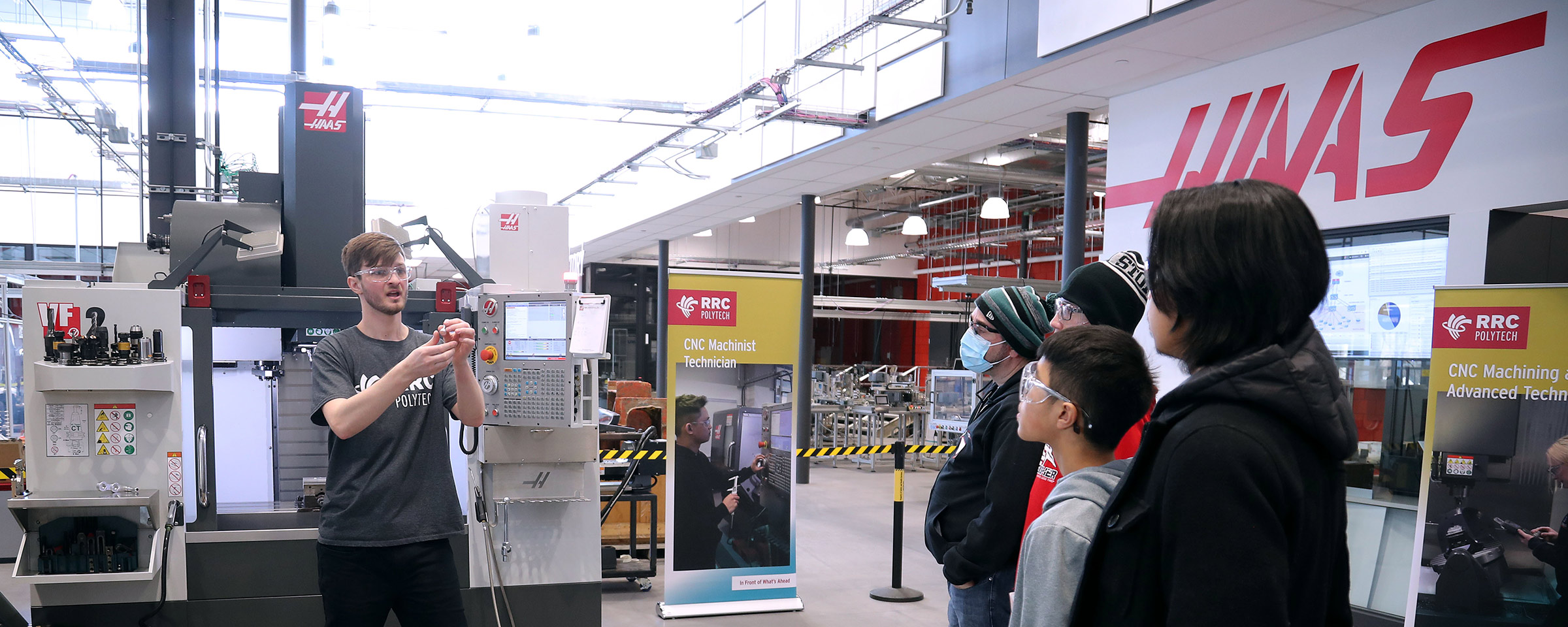 Instructor taking photo of students at the Haas bootcamp