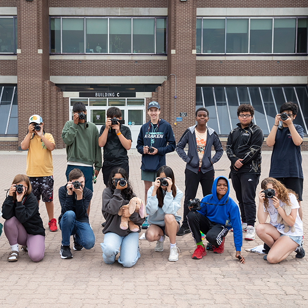 group of kids with cameras