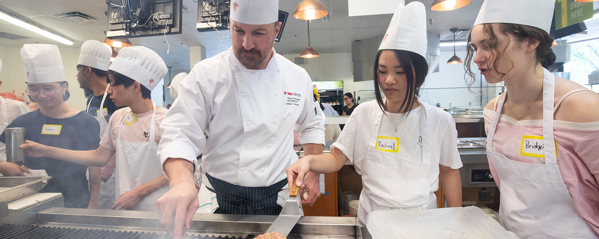 kids with chef cooking on grill